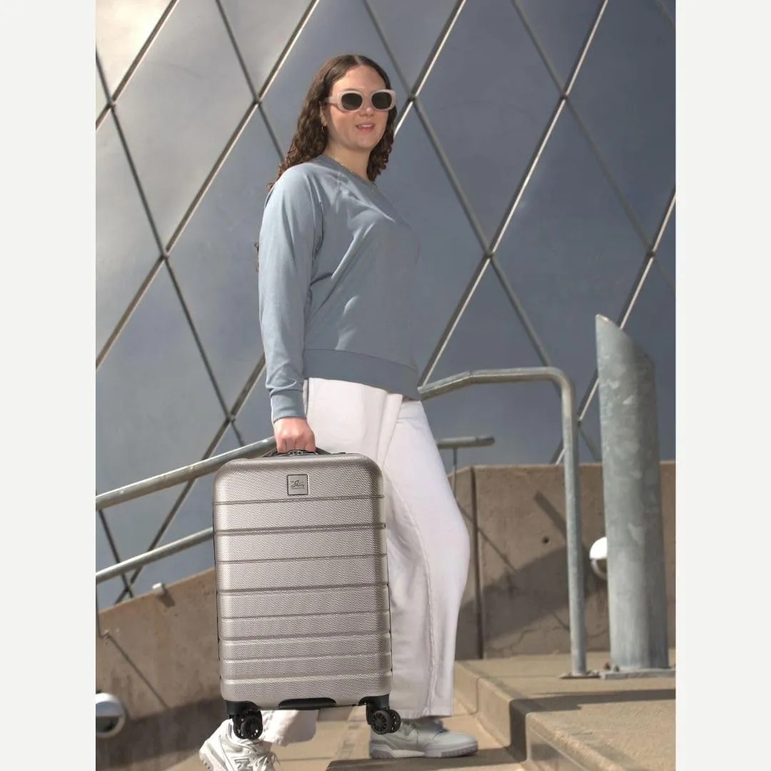 Skyway Epic 2.0 Hardside Lightweight and Durable ABS Shell Luggage, Spacious with Dual Spinning Wheels, Comfort Grip, Men and Women, Carry-on, 20-inch, Bone