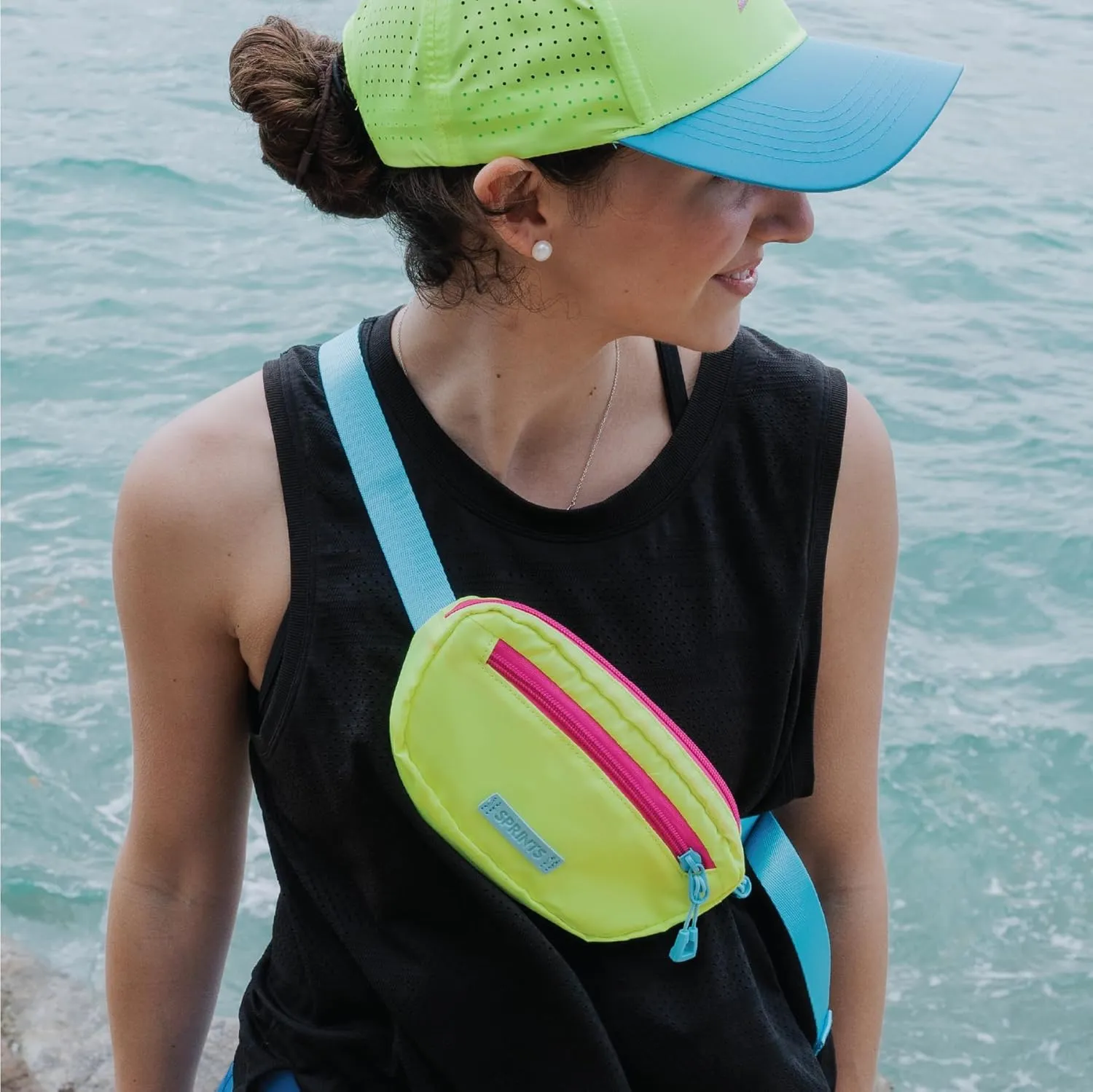 Sprints Small Cross Body Sling It Bag (Alien Acid Glow)